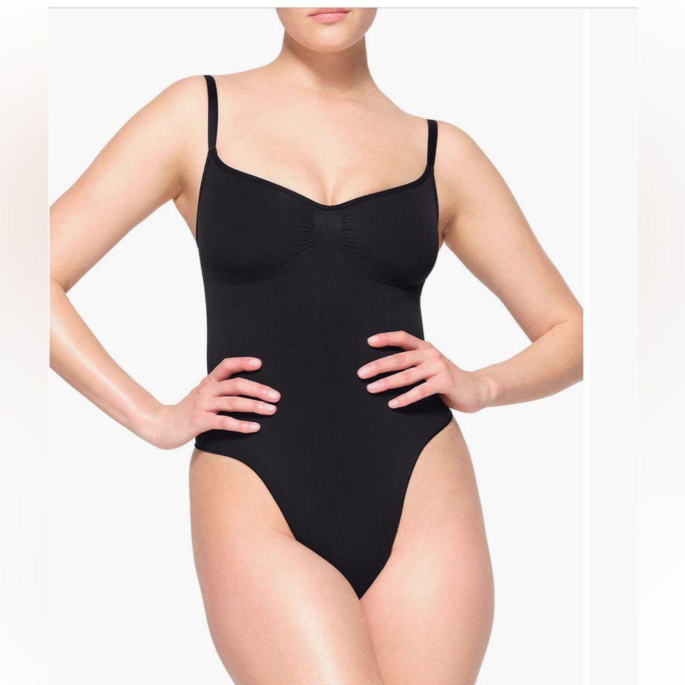 Skims black seamless sculpt thong bodysuit